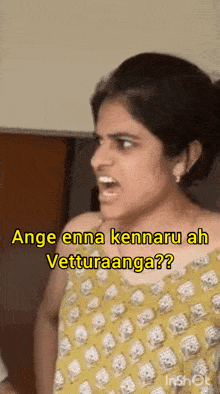 a woman is making a funny face with the words ange enna kennaru ah vetturaanga written below her