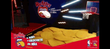 an advertisement for ruffles chips with a basketball hoop
