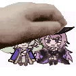 a hand is holding a cartoon character and a cartoon character is sitting under it .