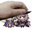 a hand is holding a cartoon character and a cartoon character is sitting under it .