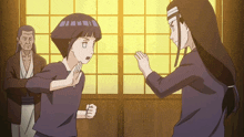 a couple of anime characters standing next to each other with a man standing behind them