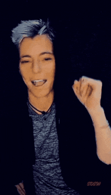 a woman is pointing at the camera with the words i like you behind her