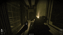 a screenshot of a video game shows a man holding a gun in a hallway