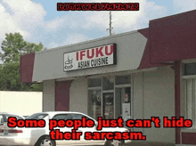 a white car is parked in front of a ifuku asian cuisine
