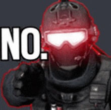 a soldier wearing a helmet and goggles is pointing at the camera with the word no behind him .