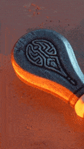 a blurred image of a blue and orange colored surface