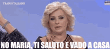 a woman in a fishnet top says no maria ti saluto and vado a casa