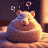 a stuffed animal hamster is sleeping on a bed