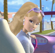 a barbie doll is sitting in a car wearing sunglasses
