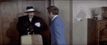 Peter Sellers Pink Panther GIF - Peter Sellers Pink Panther Godfather GIFs