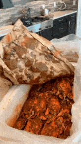 a bag of crabs is sitting on a table