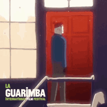 a poster for the la guarimba international film festival shows a man standing in front of a red door