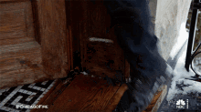 a person standing on a wooden staircase with the hashtag #chicagofire on it