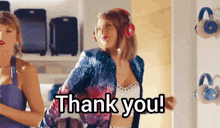 a woman wearing headphones is dancing with the words thank you behind her