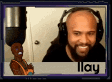 a picture of a man wearing headphones with the name llay on the bottom right