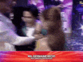 a blurred image of a group of people with the name ma germaine recio on the bottom