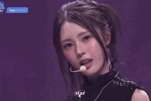 a close up of a woman 's face with the word star on the bottom