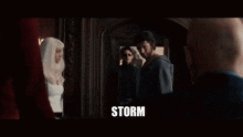 a group of people in a room with the word storm written on the bottom