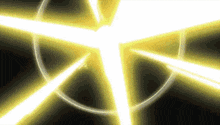 a yellow light is coming out of a circle in the dark .