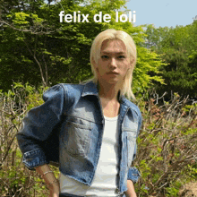 a picture of felix de loli standing in front of trees