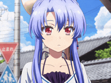 a girl with blue hair and red eyes stands in front of a sign that says ' a ' on it