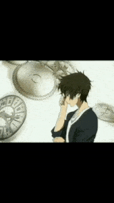 a man stands in front of a clock with roman numerals on it