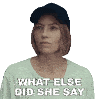a woman wearing a baseball cap and a t-shirt that says what else did she say