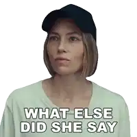 a woman wearing a baseball cap and a t-shirt that says what else did she say