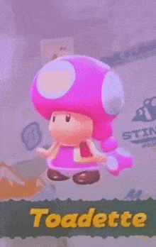 a pink toadette from a video game is flying in the air