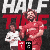 a soccer player in a red shirt is celebrating a goal