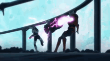 a couple of people are standing next to each other on a bridge and fighting .