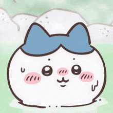a cartoon character with a blue bow on his head