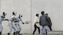 a blurry photo of people walking in a line