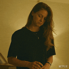 a woman says " i hate my job " in front of a netflix logo