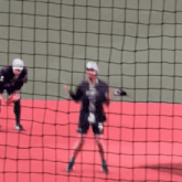 a blurred image of a person jumping over a fence with a jersey that says ' a ' on it