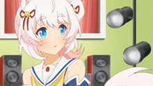 a girl with white hair and blue eyes is looking at the camera