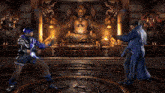 a man and a woman are fighting in a video game with a buddha in the background