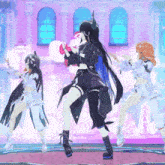 a group of anime girls are dancing on a stage in front of a pink building