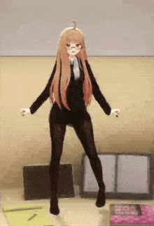 a girl in a suit and tie is dancing