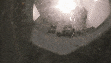 a close up of a glass container with a few bubbles on it