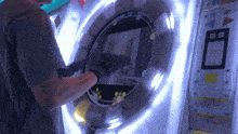 a man is playing a game with a button that says putxo