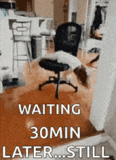 a dog is laying on top of an office chair with the words `` waiting 30min later ... still '' .