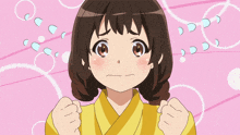 a girl with a surprised look on her face is wearing a yellow kimono