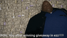 a man laying on a pile of money with the words pov you after winning giveaway in ezz