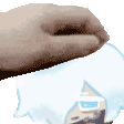 a hand is holding a piece of paper with a picture of a character on it .
