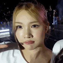 a close up of a woman making a face