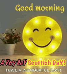 a very gay scottish day greeting card with a smiley face