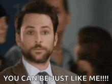 a man in a suit and tie is saying `` you can be just like me !!! ''