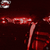 a red and black photo of a person with the word media on the bottom