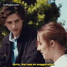 a man and a woman are talking to each other in a movie .